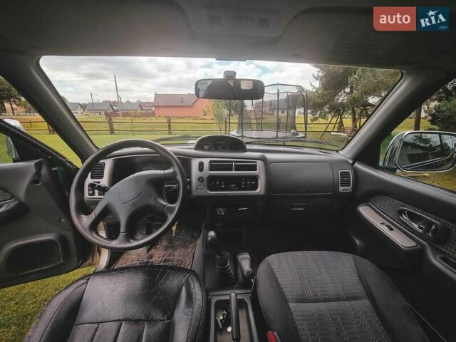 Зеленый Мицубиси Л 200, объемом двигателя 2.5 л и пробегом 268 тыс. км за 3100 $, фото 3 на Automoto.ua