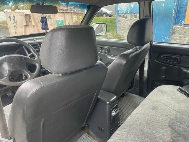 Зеленый Мицубиси Л 200, объемом двигателя 2.5 л и пробегом 250 тыс. км за 4200 $, фото 10 на Automoto.ua