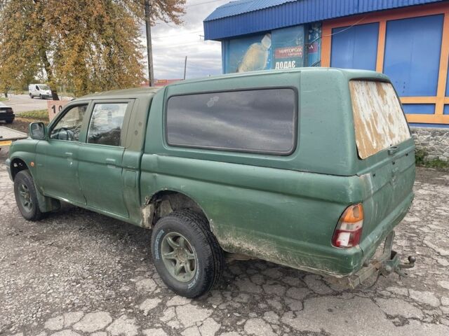 Зеленый Мицубиси Л 200, объемом двигателя 2.5 л и пробегом 250 тыс. км за 4200 $, фото 2 на Automoto.ua