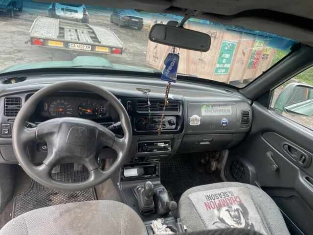 Зеленый Мицубиси Л 200, объемом двигателя 2.5 л и пробегом 250 тыс. км за 4200 $, фото 11 на Automoto.ua