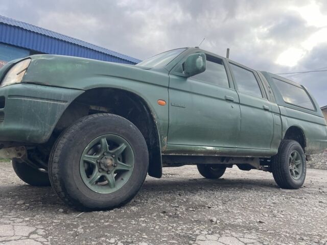 Зеленый Мицубиси Л 200, объемом двигателя 2.5 л и пробегом 250 тыс. км за 4200 $, фото 7 на Automoto.ua
