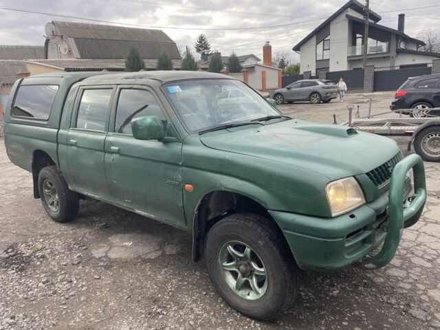Зеленый Мицубиси Л 200, объемом двигателя 2.5 л и пробегом 250 тыс. км за 4200 $, фото 4 на Automoto.ua