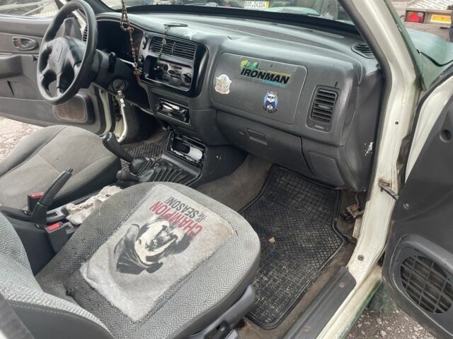 Зеленый Мицубиси Л 200, объемом двигателя 2.5 л и пробегом 250 тыс. км за 4200 $, фото 13 на Automoto.ua