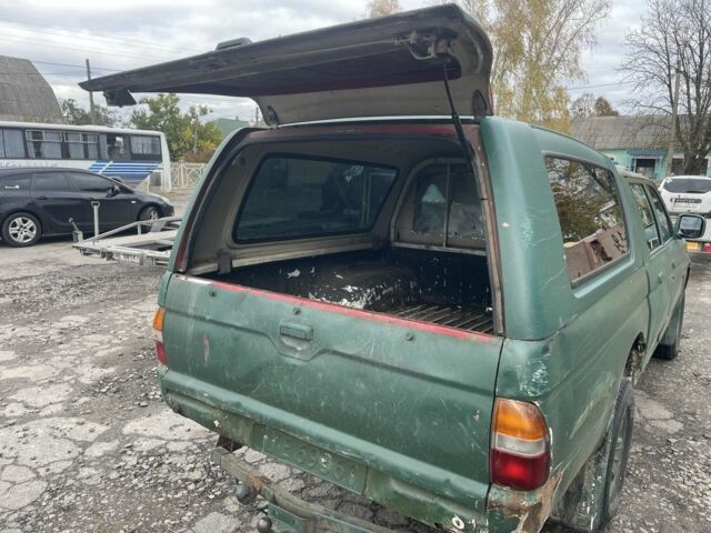 Зеленый Мицубиси Л 200, объемом двигателя 2.5 л и пробегом 250 тыс. км за 4200 $, фото 14 на Automoto.ua