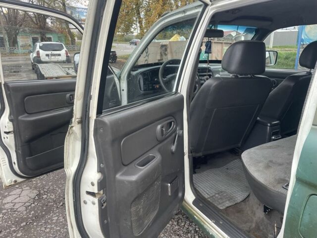 Зеленый Мицубиси Л 200, объемом двигателя 2.5 л и пробегом 250 тыс. км за 4200 $, фото 12 на Automoto.ua