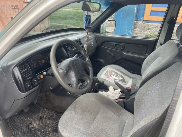 Зеленый Мицубиси Л 200, объемом двигателя 2.5 л и пробегом 250 тыс. км за 4200 $, фото 8 на Automoto.ua