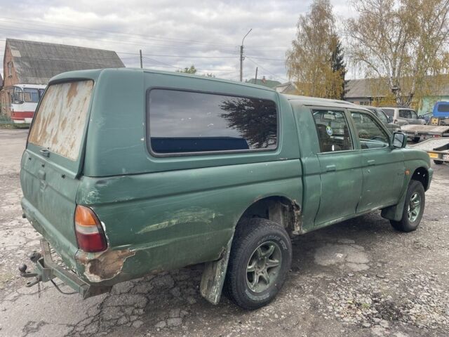 Зеленый Мицубиси Л 200, объемом двигателя 2.5 л и пробегом 250 тыс. км за 4200 $, фото 3 на Automoto.ua