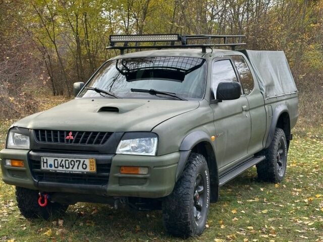 Зеленый Мицубиси Л 200, объемом двигателя 2.5 л и пробегом 280 тыс. км за 5700 $, фото 1 на Automoto.ua
