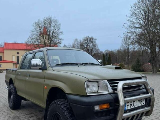 Зеленый Мицубиси Л 200, объемом двигателя 2.5 л и пробегом 197 тыс. км за 2600 $, фото 3 на Automoto.ua