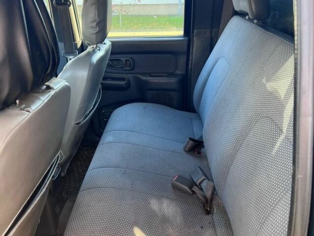 Зеленый Мицубиси Л 200, объемом двигателя 2.5 л и пробегом 380 тыс. км за 4875 $, фото 6 на Automoto.ua