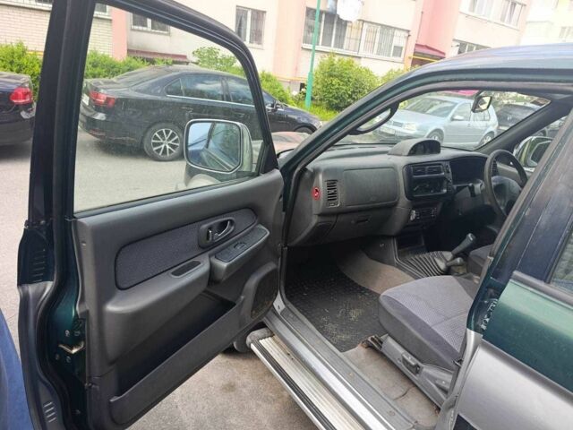 Зелений Міцубісі Л 200, об'ємом двигуна 2.5 л та пробігом 100 тис. км за 6325 $, фото 3 на Automoto.ua