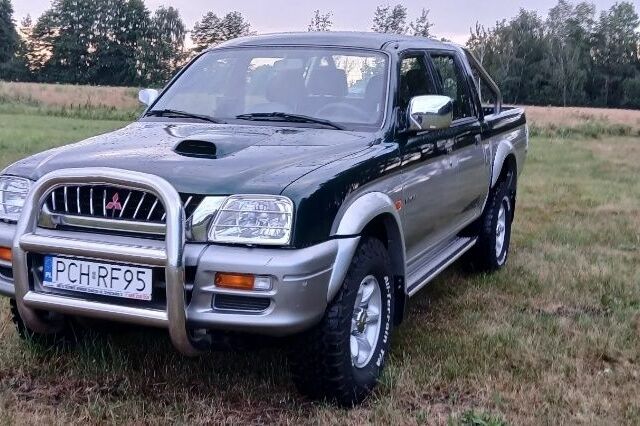 Зеленый Мицубиси Л 200, объемом двигателя 0 л и пробегом 244 тыс. км за 2642 $, фото 1 на Automoto.ua