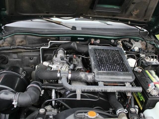 Зеленый Мицубиси Л 200, объемом двигателя 0 л и пробегом 232 тыс. км за 2500 $, фото 15 на Automoto.ua