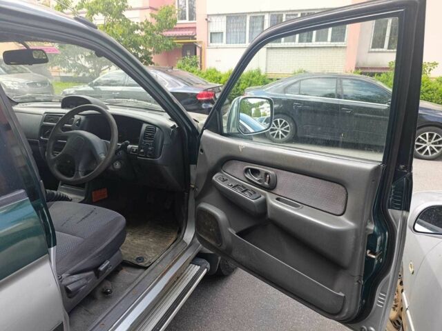 Зелений Міцубісі Л 200, об'ємом двигуна 2.5 л та пробігом 100 тис. км за 6325 $, фото 4 на Automoto.ua