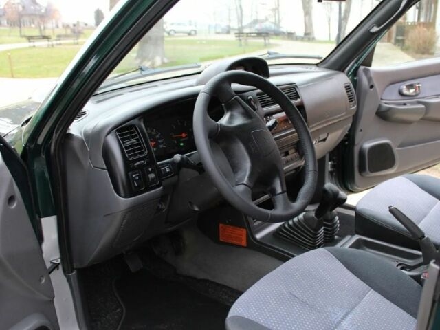 Зеленый Мицубиси Л 200, объемом двигателя 0 л и пробегом 222 тыс. км за 2700 $, фото 9 на Automoto.ua