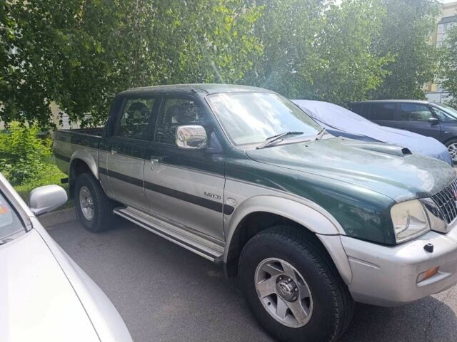 Зелений Міцубісі Л 200, об'ємом двигуна 2.5 л та пробігом 100 тис. км за 6325 $, фото 9 на Automoto.ua