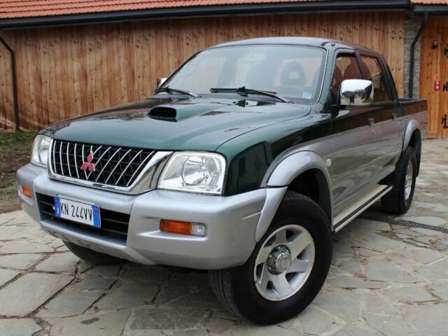 Зеленый Мицубиси Л 200, объемом двигателя 0 л и пробегом 224 тыс. км за 2650 $, фото 2 на Automoto.ua