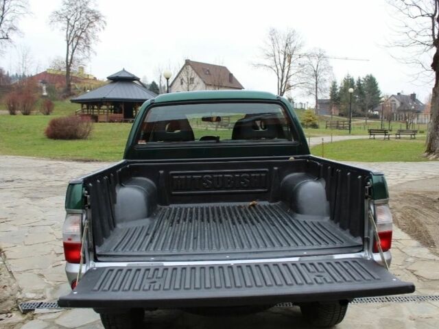 Зеленый Мицубиси Л 200, объемом двигателя 0 л и пробегом 232 тыс. км за 2500 $, фото 6 на Automoto.ua