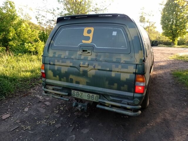 Зелений Міцубісі Л 200, об'ємом двигуна 0.25 л та пробігом 220 тис. км за 3399 $, фото 3 на Automoto.ua