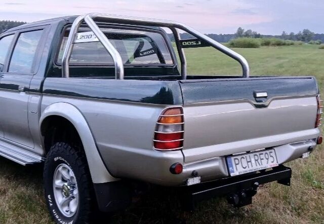 Зелений Міцубісі Л 200, об'ємом двигуна 0 л та пробігом 211 тис. км за 2600 $, фото 12 на Automoto.ua