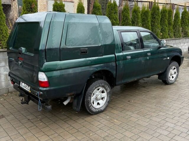 Зеленый Мицубиси Л 200, объемом двигателя 2.5 л и пробегом 380 тыс. км за 4875 $, фото 7 на Automoto.ua