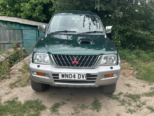 Зеленый Мицубиси Л 200, объемом двигателя 2.5 л и пробегом 124 тыс. км за 4800 $, фото 4 на Automoto.ua
