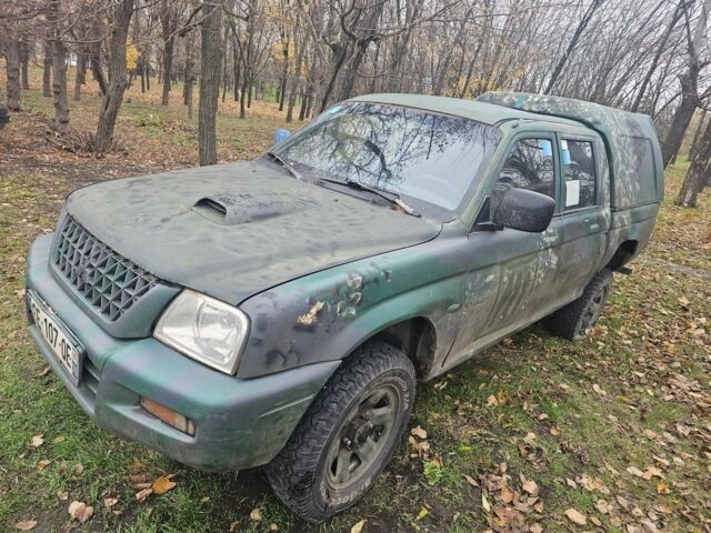 Зелений Міцубісі Л 200, об'ємом двигуна 2.5 л та пробігом 250 тис. км за 2620 $, фото 1 на Automoto.ua