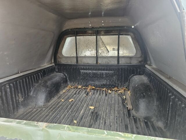 Зелений Міцубісі Л 200, об'ємом двигуна 2.5 л та пробігом 250 тис. км за 2620 $, фото 4 на Automoto.ua