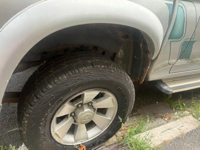 Зеленый Мицубиси Л 200, объемом двигателя 0 л и пробегом 240 тыс. км за 6100 $, фото 1 на Automoto.ua