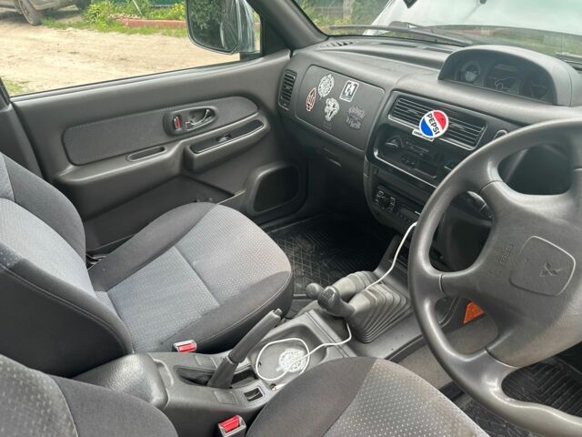 Зеленый Мицубиси Л 200, объемом двигателя 2.5 л и пробегом 124 тыс. км за 4800 $, фото 7 на Automoto.ua