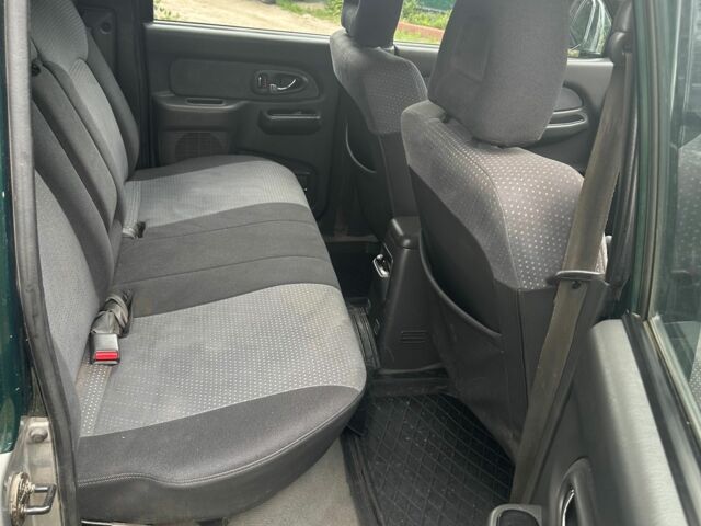 Зеленый Мицубиси Л 200, объемом двигателя 2.5 л и пробегом 124 тыс. км за 4800 $, фото 8 на Automoto.ua