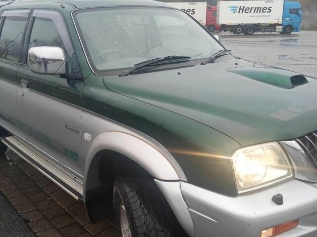 Зеленый Мицубиси Л 200, объемом двигателя 0 л и пробегом 240 тыс. км за 6100 $, фото 6 на Automoto.ua