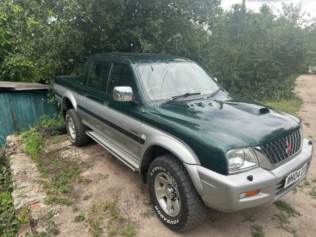 Зеленый Мицубиси Л 200, объемом двигателя 2.5 л и пробегом 124 тыс. км за 4800 $, фото 3 на Automoto.ua