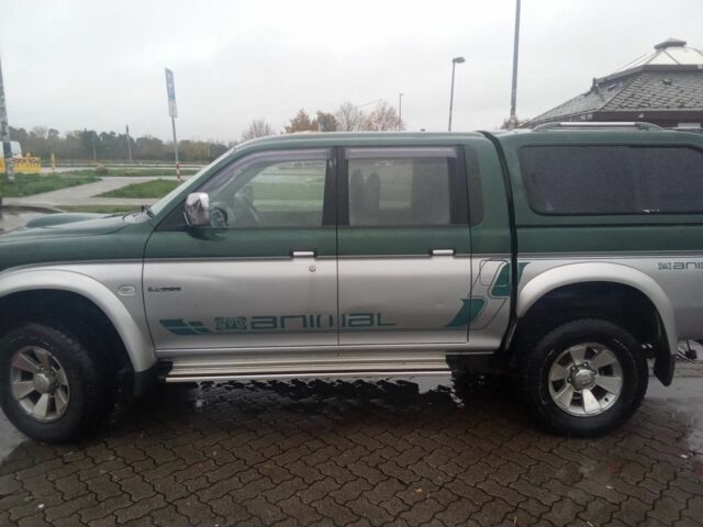 Зеленый Мицубиси Л 200, объемом двигателя 0 л и пробегом 240 тыс. км за 6100 $, фото 7 на Automoto.ua