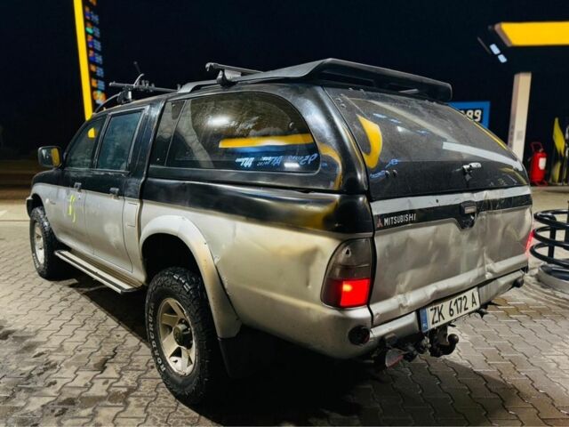 Зеленый Мицубиси Л 200, объемом двигателя 0 л и пробегом 130 тыс. км за 4500 $, фото 4 на Automoto.ua