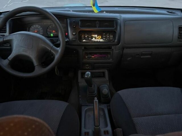 Зеленый Мицубиси Л 200, объемом двигателя 2.5 л и пробегом 380 тыс. км за 4400 $, фото 3 на Automoto.ua