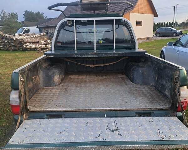 Зеленый Мицубиси Л 200, объемом двигателя 2.5 л и пробегом 264 тыс. км за 5537 $, фото 10 на Automoto.ua