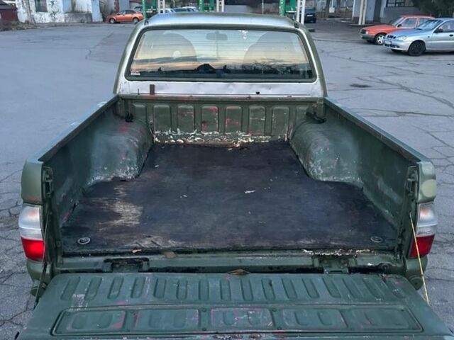 Зеленый Мицубиси Л 200, объемом двигателя 2.5 л и пробегом 380 тыс. км за 4400 $, фото 2 на Automoto.ua