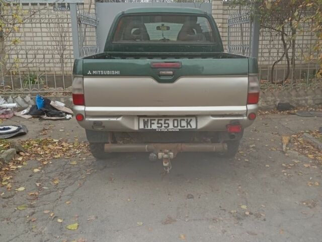 Зеленый Мицубиси Л 200, объемом двигателя 2.5 л и пробегом 200 тыс. км за 2500 $, фото 4 на Automoto.ua