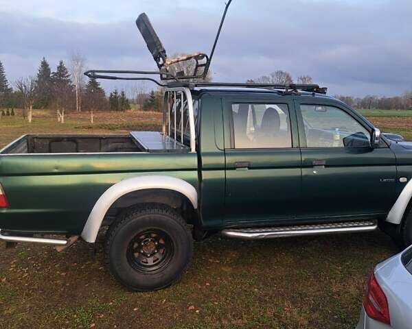 Зеленый Мицубиси Л 200, объемом двигателя 2.5 л и пробегом 264 тыс. км за 5537 $, фото 4 на Automoto.ua