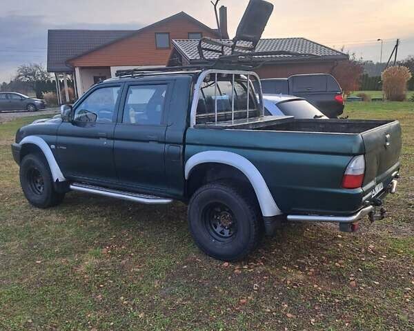 Зеленый Мицубиси Л 200, объемом двигателя 2.5 л и пробегом 264 тыс. км за 5537 $, фото 11 на Automoto.ua