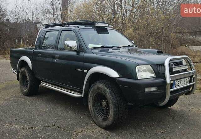 Зеленый Мицубиси Л 200, объемом двигателя 2.5 л и пробегом 264 тыс. км за 5537 $, фото 16 на Automoto.ua