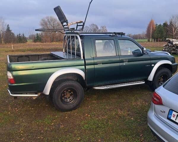 Зеленый Мицубиси Л 200, объемом двигателя 2.5 л и пробегом 264 тыс. км за 5537 $, фото 9 на Automoto.ua