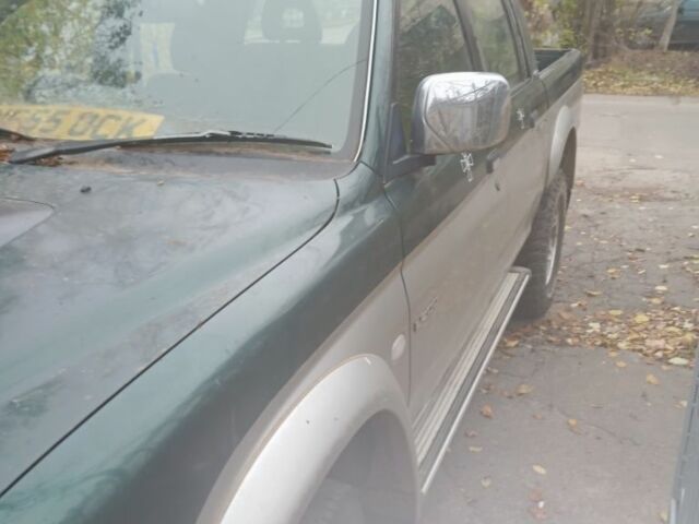 Зеленый Мицубиси Л 200, объемом двигателя 2.5 л и пробегом 200 тыс. км за 2500 $, фото 1 на Automoto.ua