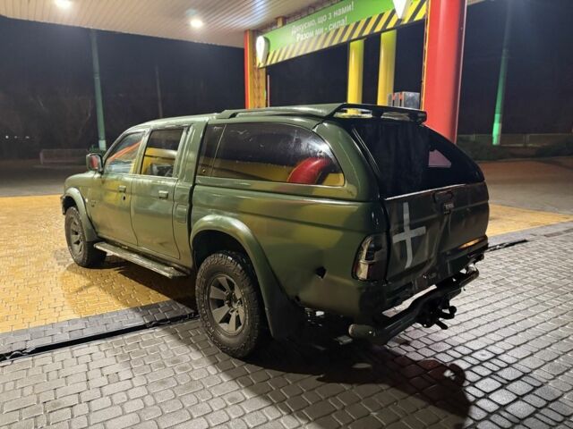 Зеленый Мицубиси Л 200, объемом двигателя 0 л и пробегом 200 тыс. км за 3700 $, фото 1 на Automoto.ua