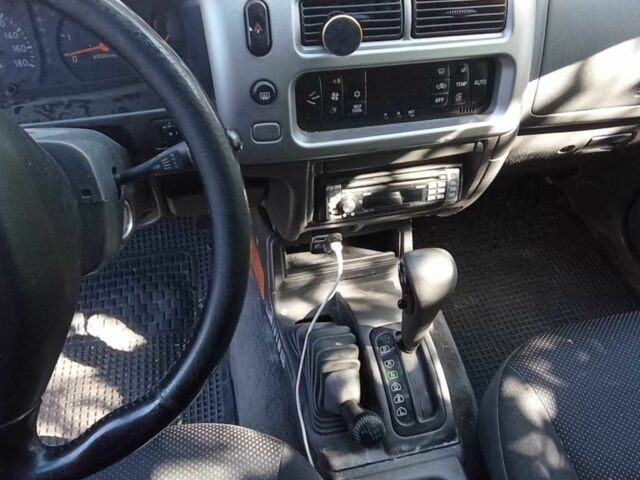 Зеленый Мицубиси Л 200, объемом двигателя 2.5 л и пробегом 303 тыс. км за 3800 $, фото 2 на Automoto.ua