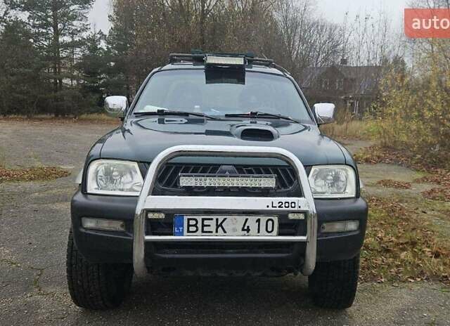 Зеленый Мицубиси Л 200, объемом двигателя 2.5 л и пробегом 264 тыс. км за 5537 $, фото 13 на Automoto.ua