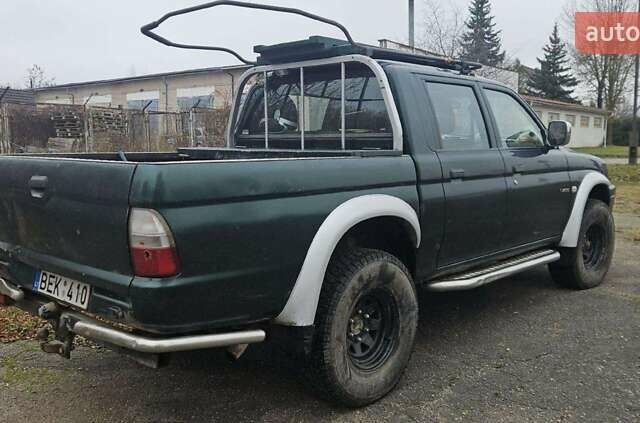 Зеленый Мицубиси Л 200, объемом двигателя 2.5 л и пробегом 264 тыс. км за 5537 $, фото 14 на Automoto.ua