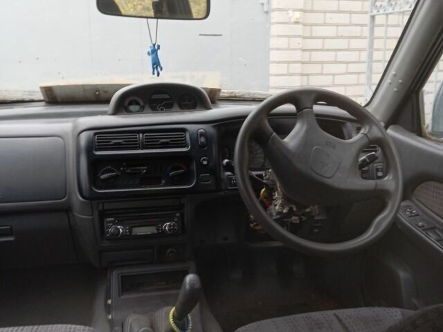 Зеленый Мицубиси Л 200, объемом двигателя 2.5 л и пробегом 200 тыс. км за 2500 $, фото 5 на Automoto.ua