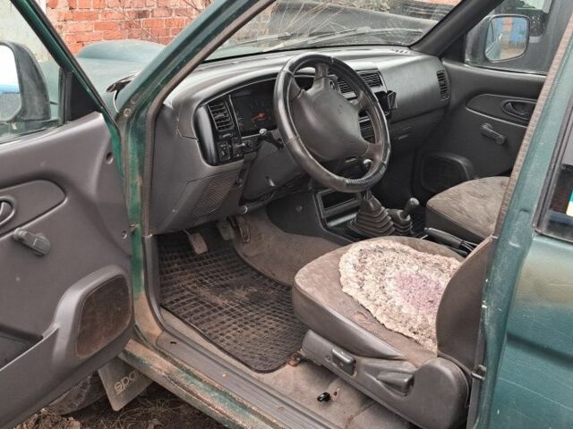 Зелений Міцубісі Л 200, об'ємом двигуна 0 л та пробігом 1000 тис. км за 3325 $, фото 7 на Automoto.ua
